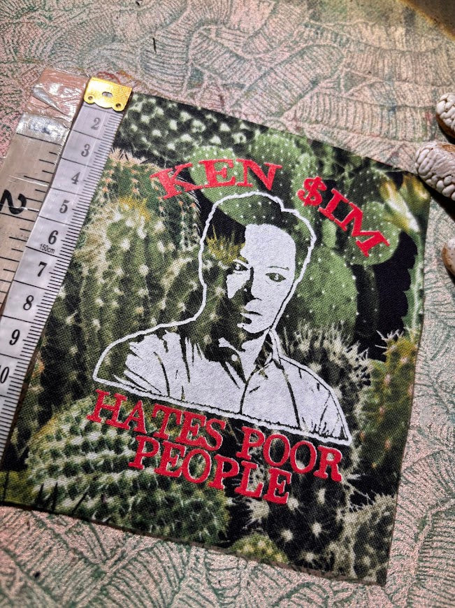 Ken Sim hates poor people sew on patch