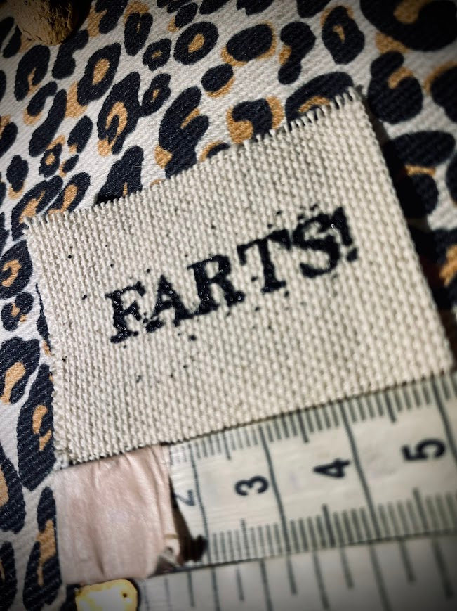 It's a tiny patch that says Farts.