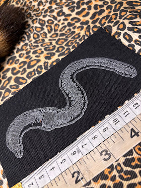 Worm sew on patch