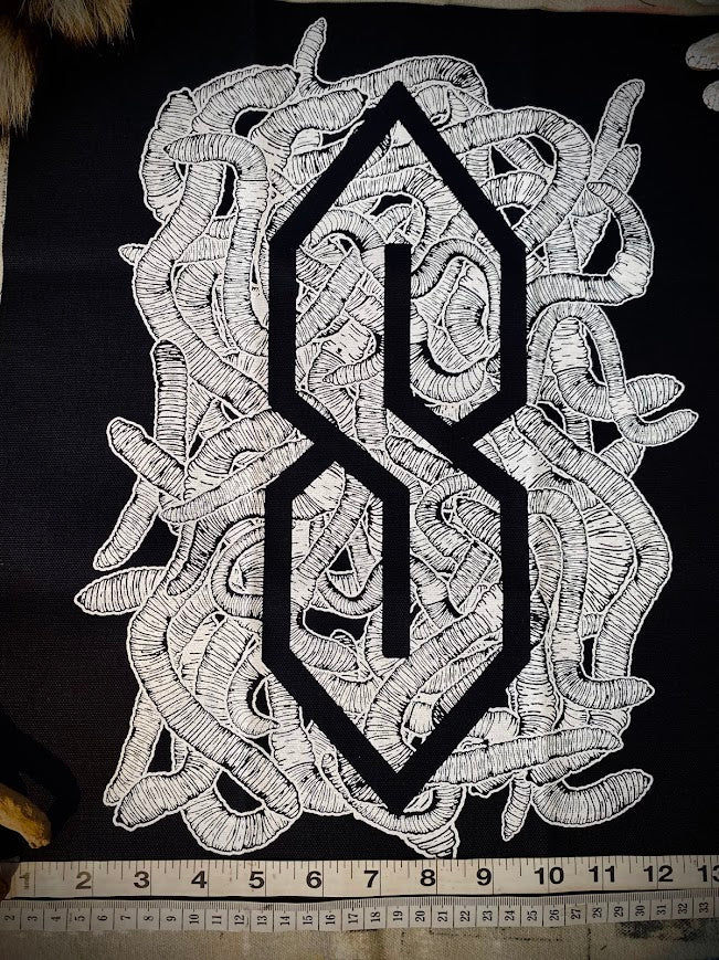 The cool S covered in worms back patch.