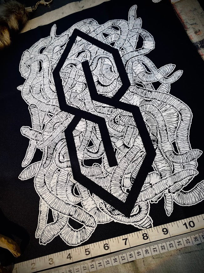 The cool S covered in worms back patch.