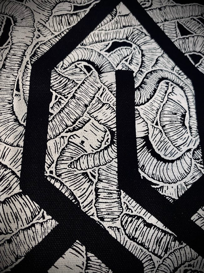 The cool S covered in worms back patch.