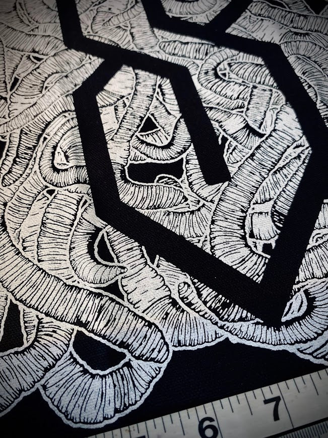 The cool S covered in worms back patch.