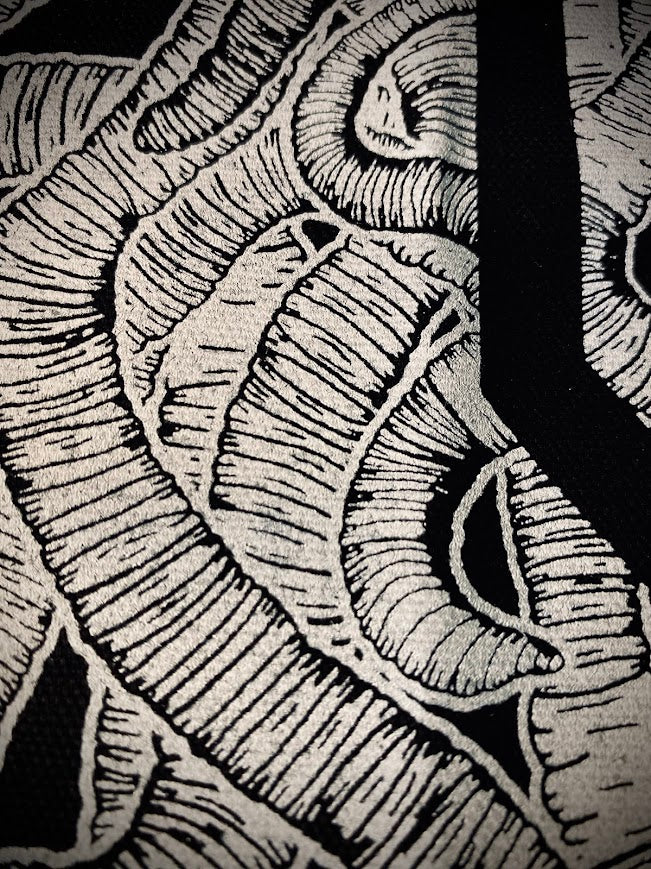 The cool S covered in worms back patch.