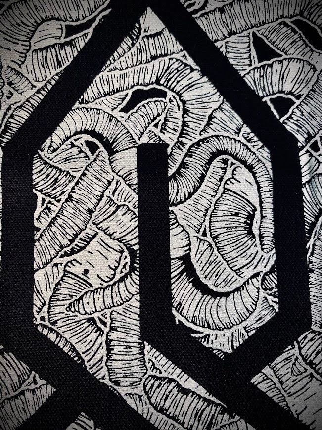 The cool S covered in worms back patch.