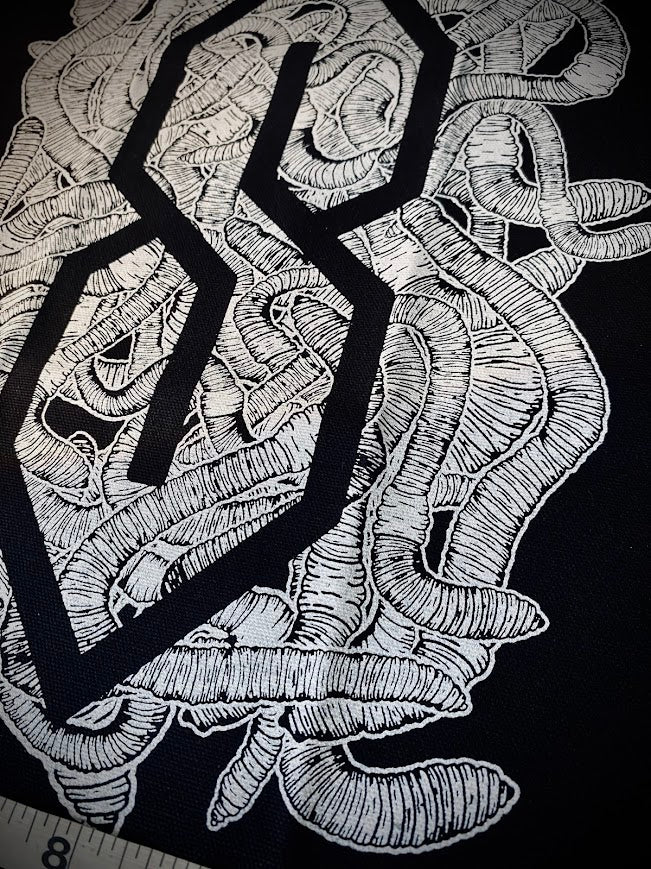 The cool S covered in worms back patch.