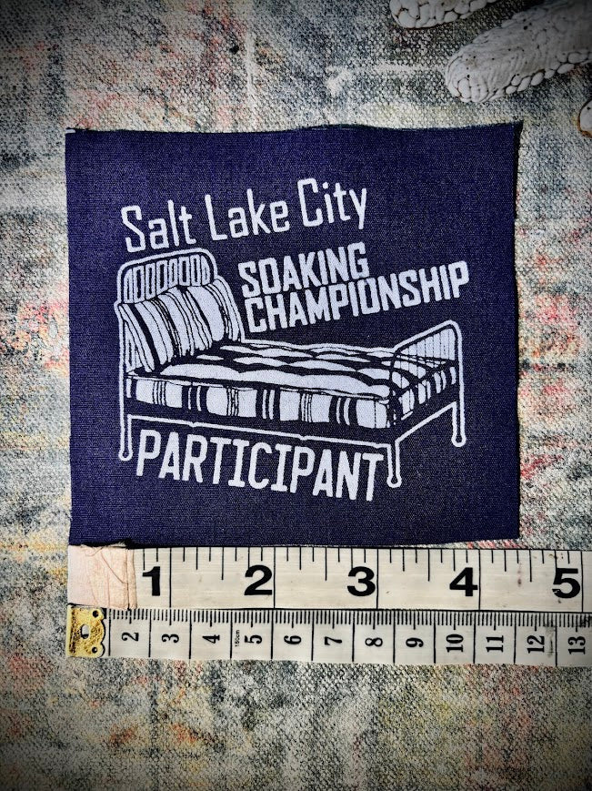 Salt Lake City Soaking Championships participation ribbon.