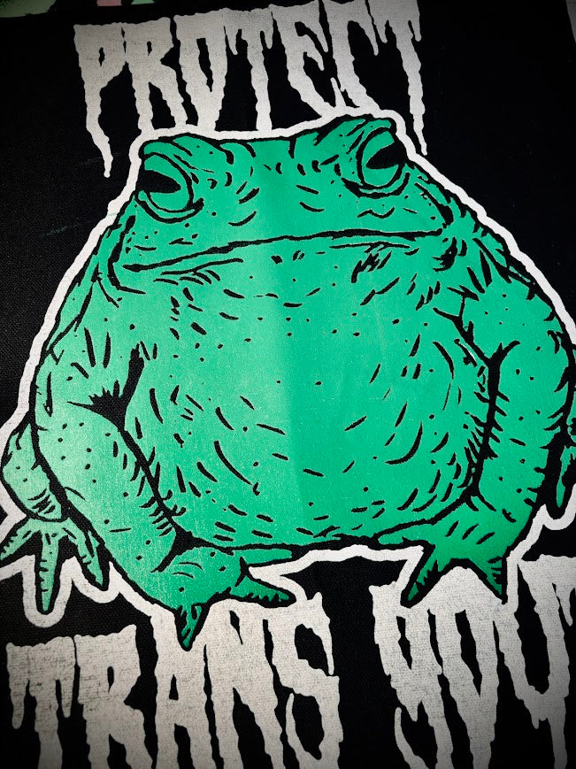 Protect trans youth with a chonky toad backpatch