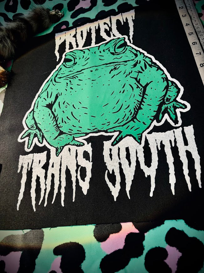 Protect trans youth with a chonky toad backpatch