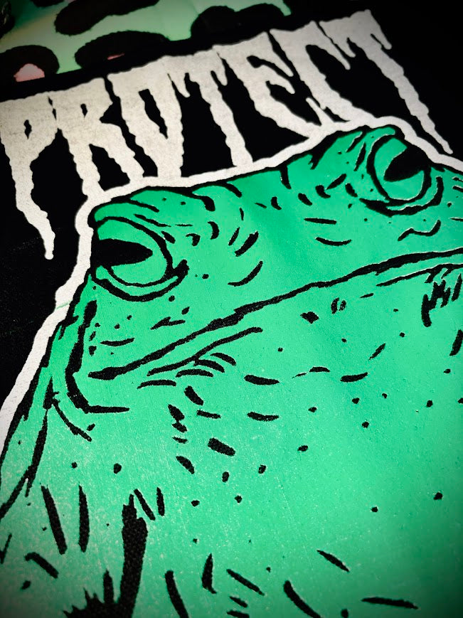 Protect trans youth with a chonky toad backpatch