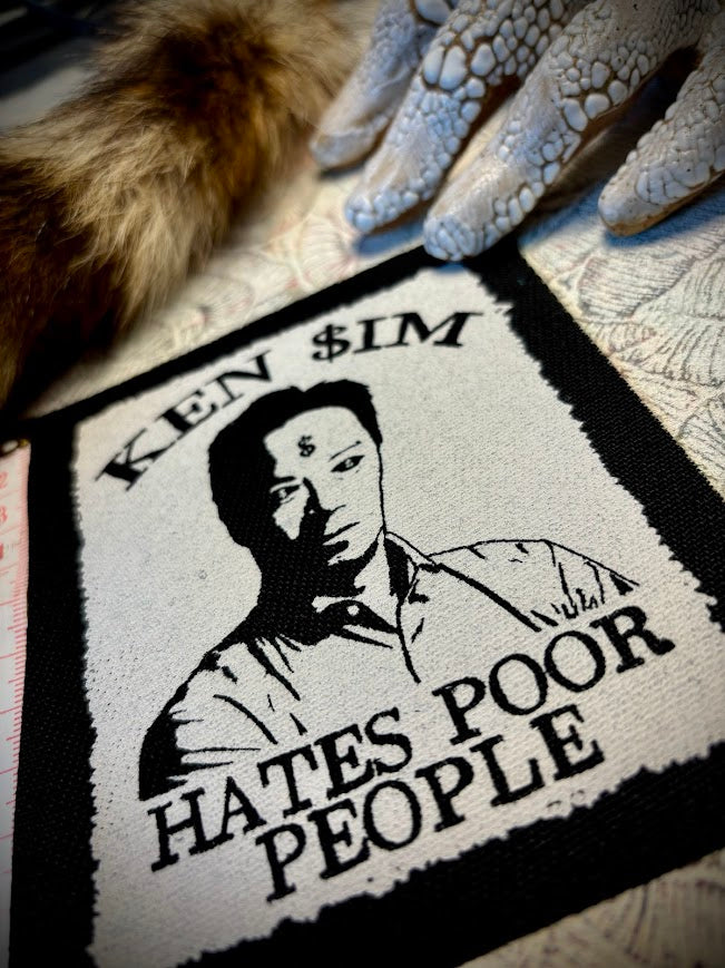 Ken Sim hates poor people sew on patch