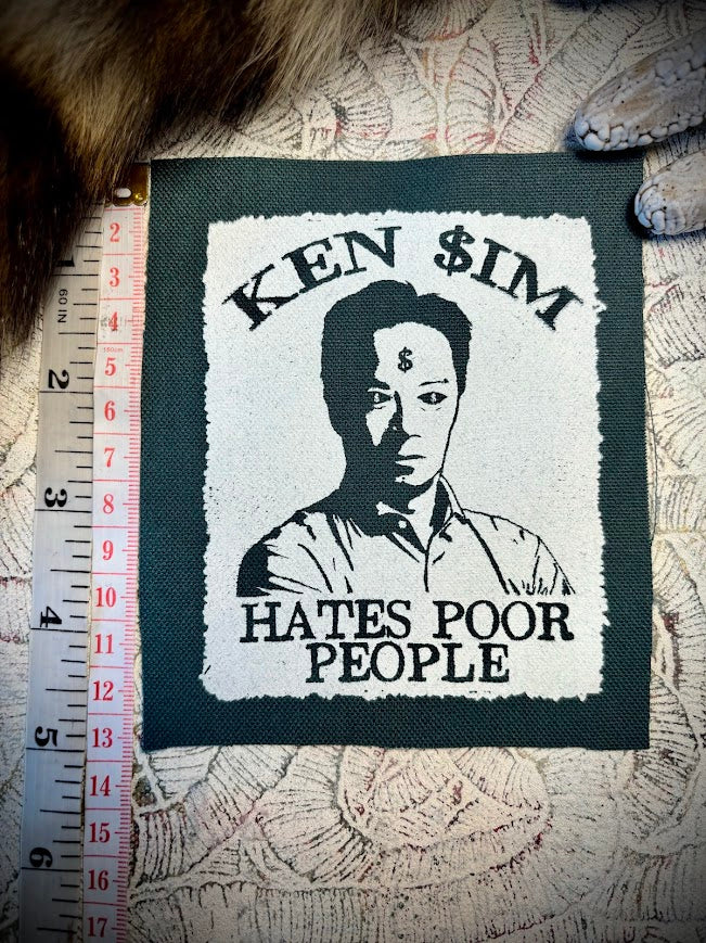 Ken Sim hates poor people sew on patch