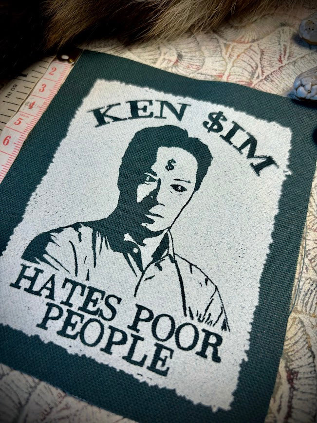 Ken Sim hates poor people sew on patch