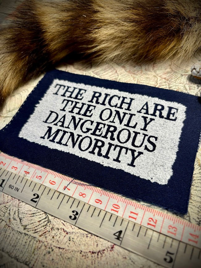 The rich are the only dangerous minority sew on patch.