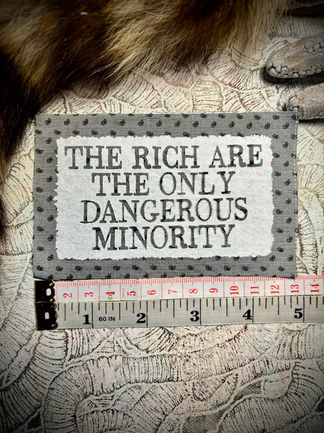 The rich are the only dangerous minority sew on patch.