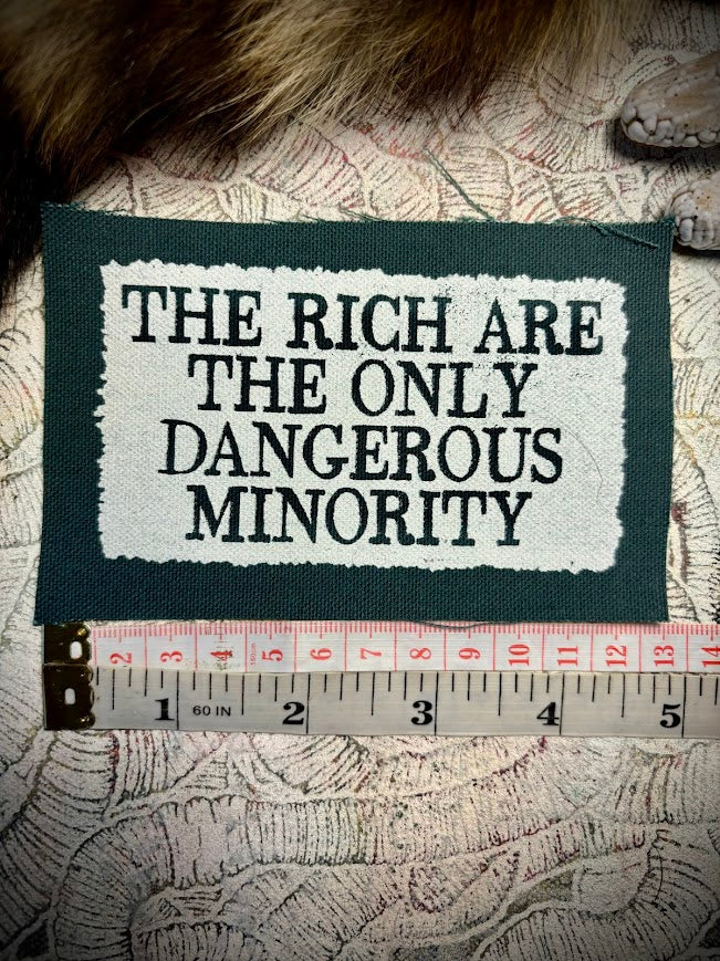 The rich are the only dangerous minority sew on patch.