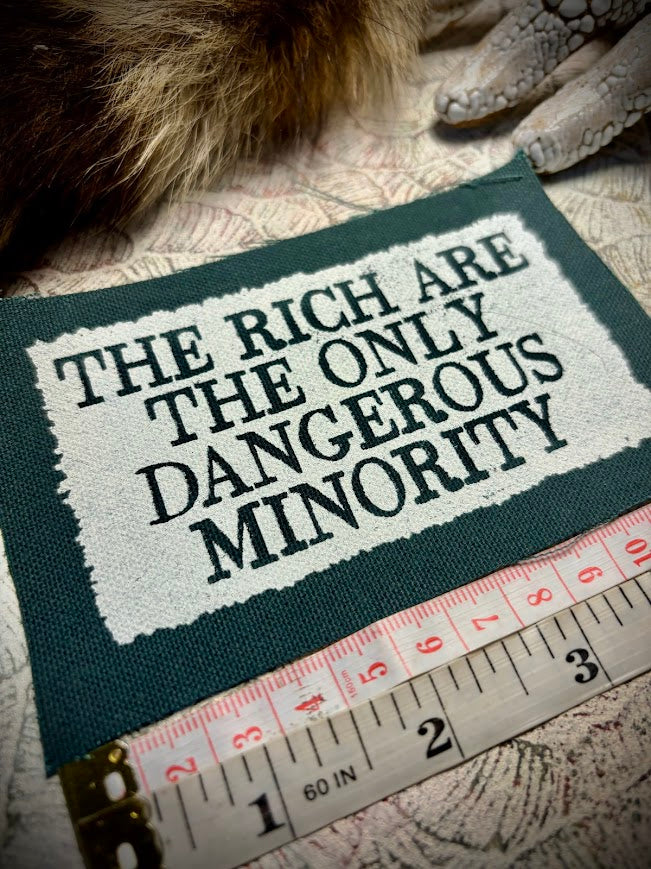 The rich are the only dangerous minority sew on patch.