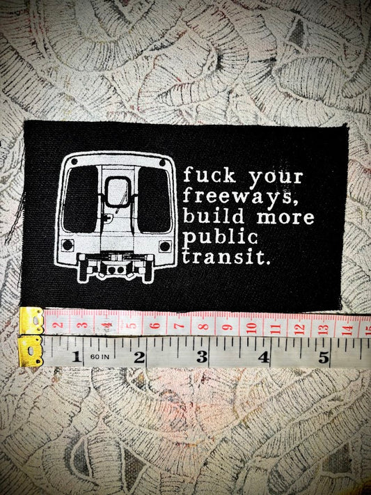 Fuck your freeways, build more public transit sew on patch.