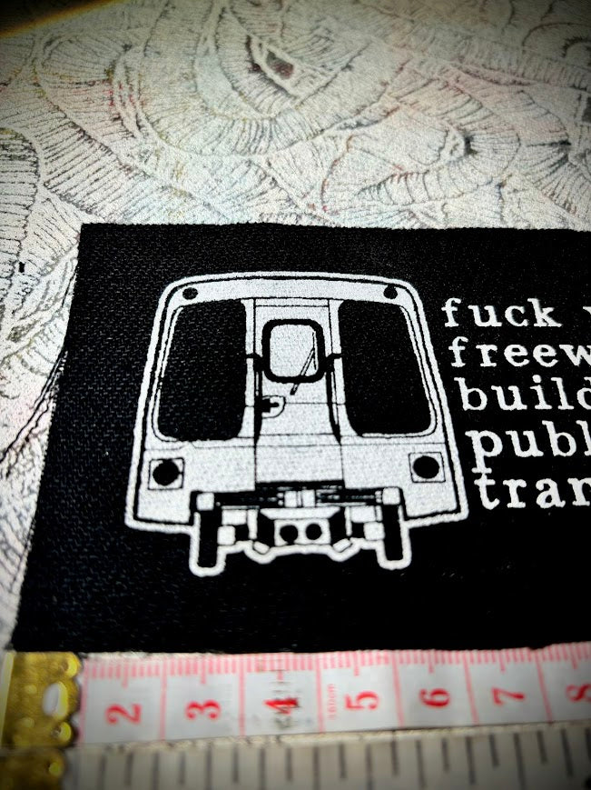 Fuck your freeways, build more public transit sew on patch.