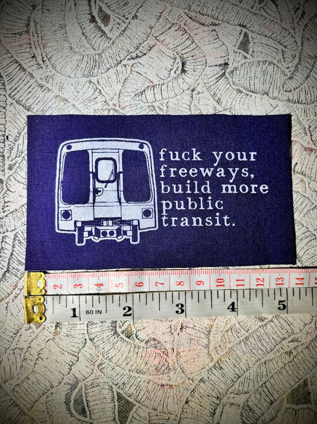 Fuck your freeways, build more public transit sew on patch.