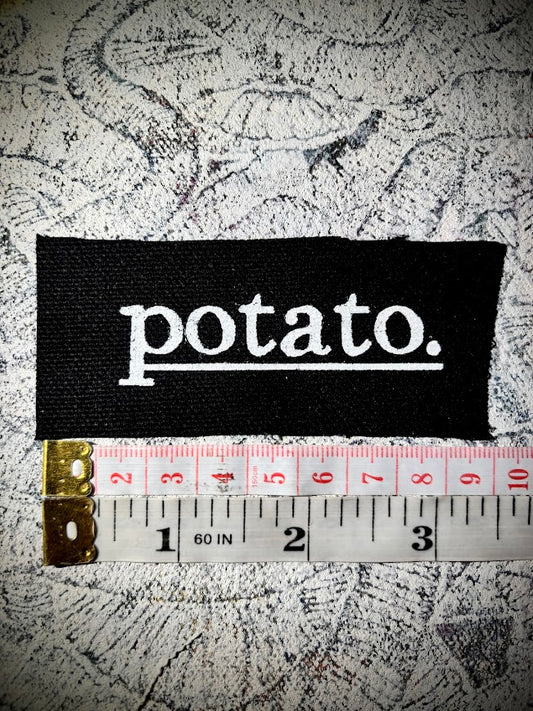 Potato patch. just a tiny patch that says potato.