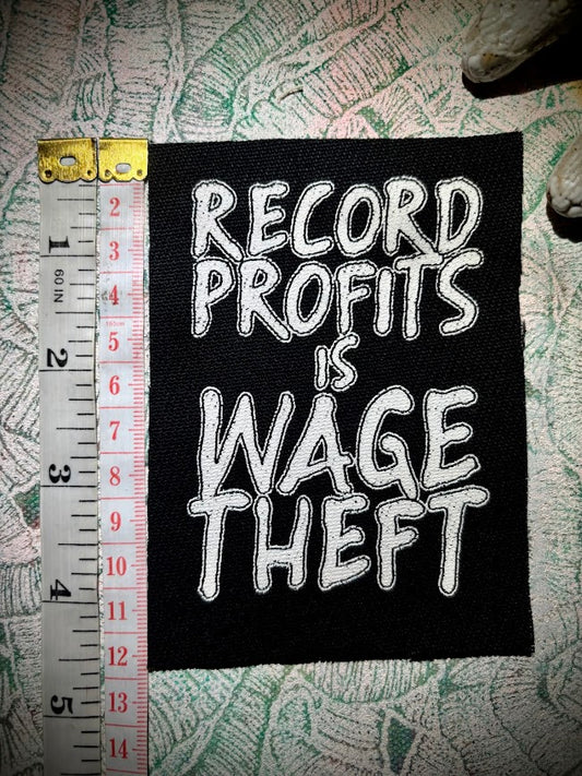 Record profits is wage theft. Sew on patch