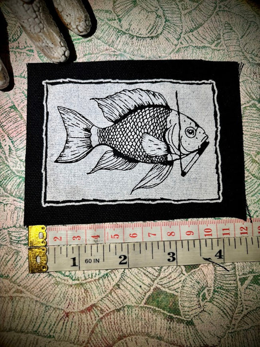 Fish smoking a cigarette patch