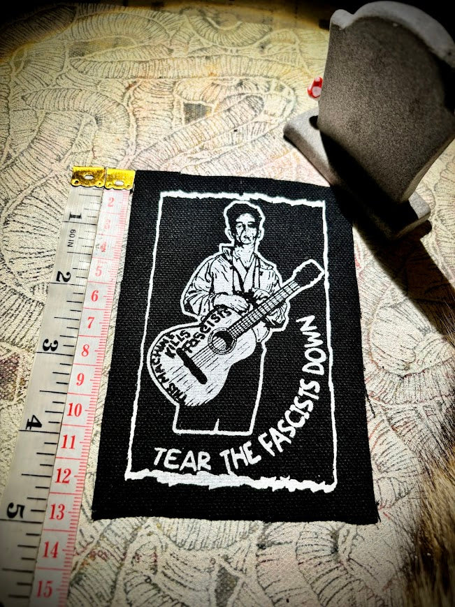 Woody Guthrie patch.