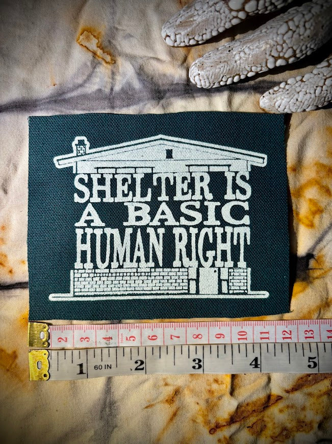 Shelter is a basic human right. sew on patch.