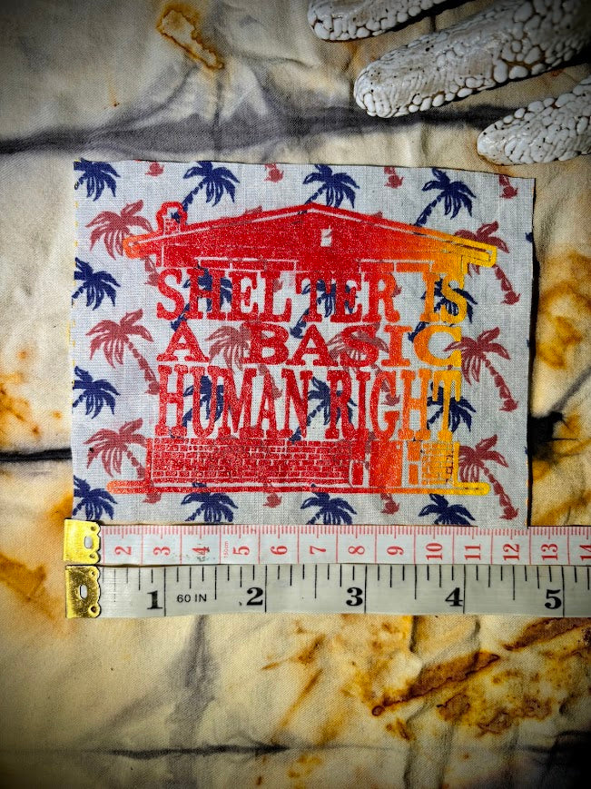 Shelter is a basic human right. sew on patch.