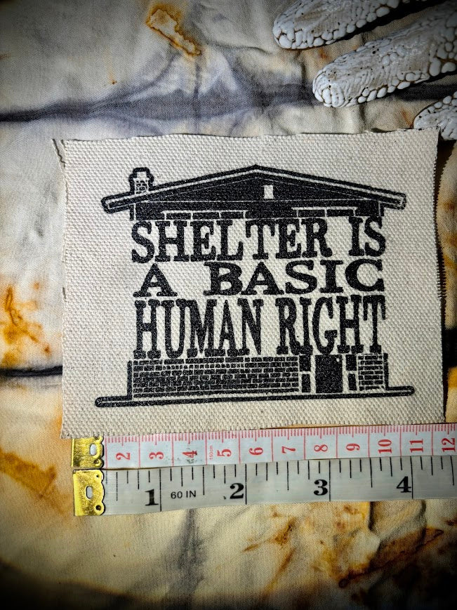 Shelter is a basic human right. sew on patch.