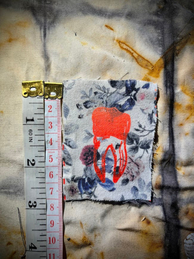 loose tooth patch. a mini patch with one toof.
