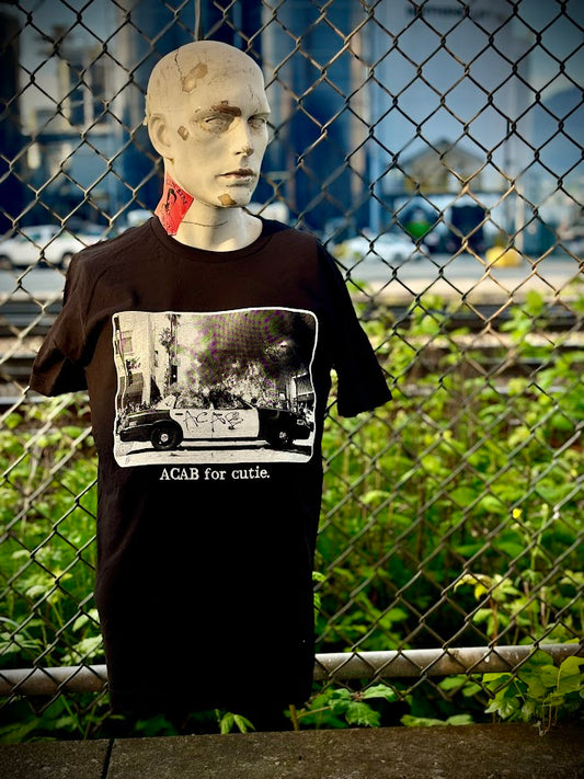 ACAB for Cutie tee. T-shirt with a burning cop car on it