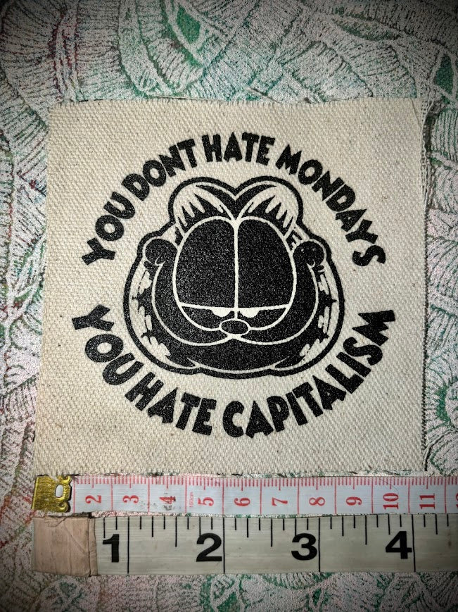 You don't hate Monday's you hate Capitalism Garfield sew on patch