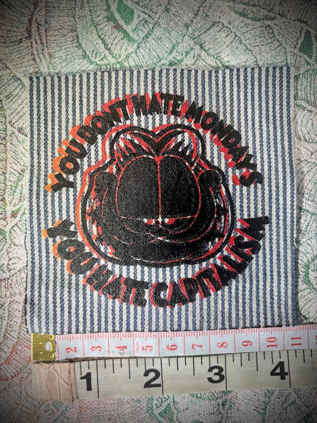 You don't hate Monday's you hate Capitalism Garfield sew on patch
