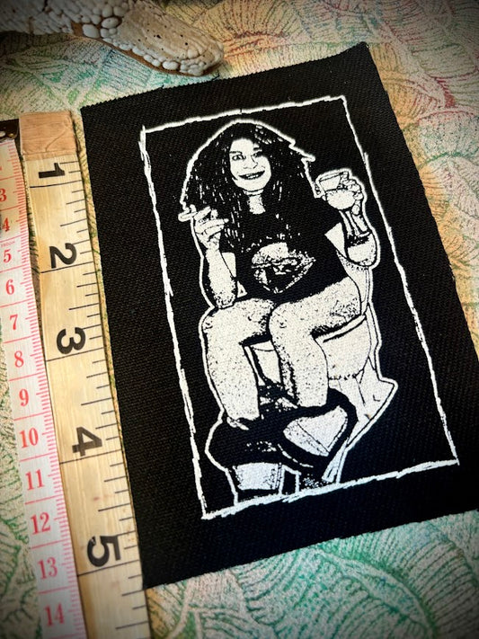 Ozzy Osbourne on the toilet.