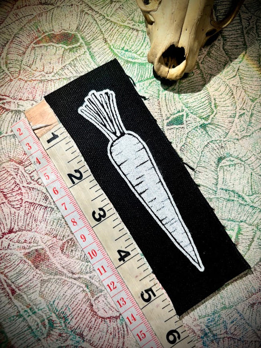 A Carrot, on a patch.
