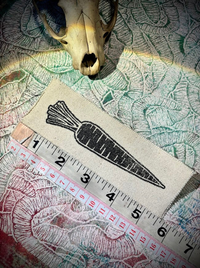 A Carrot, on a patch. that is all