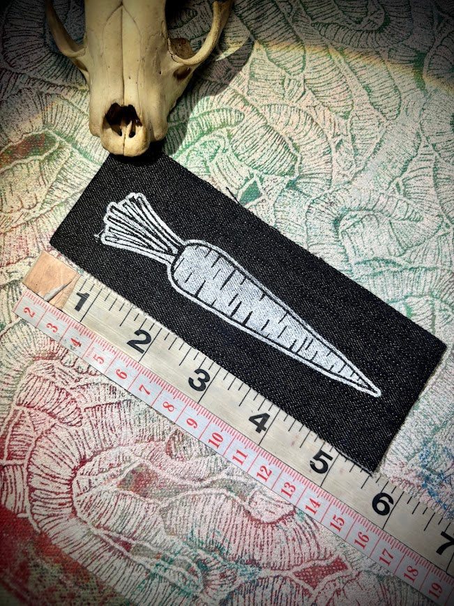 A Carrot, on a patch. that is all