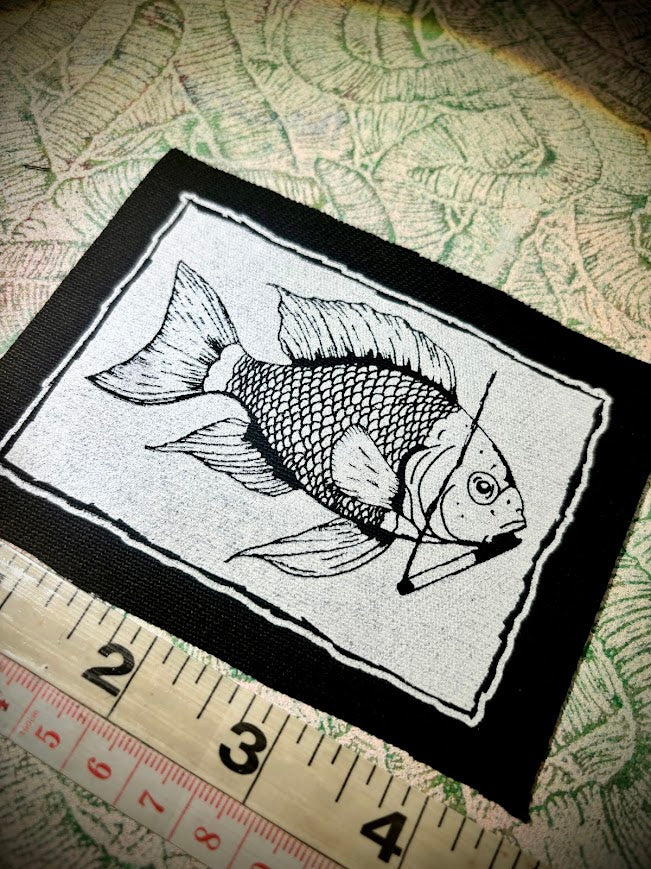 Fish smoking a cigarette patch