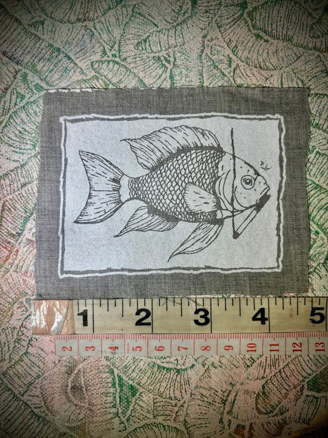 Fish smoking a cigarette patch