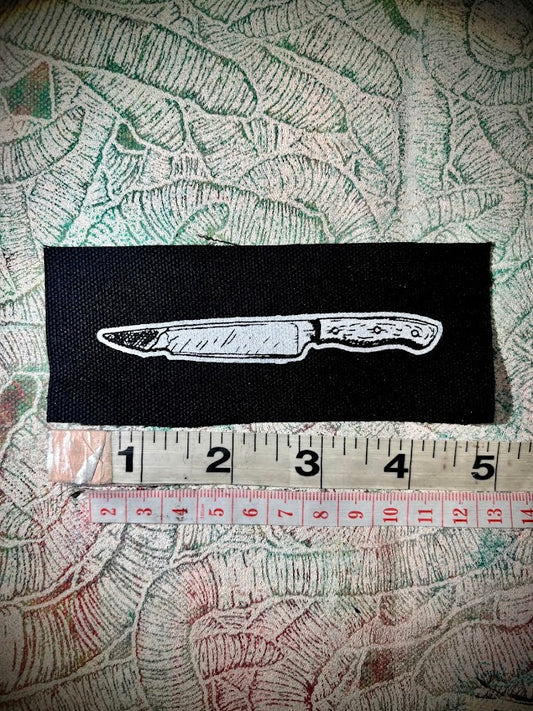 tiny knife patch.