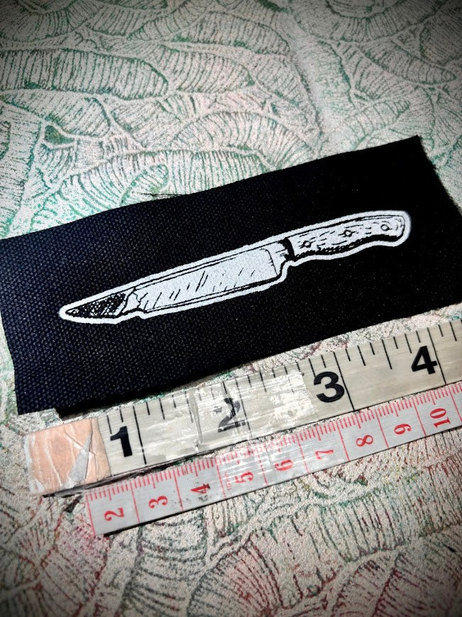 tiny knife patch.
