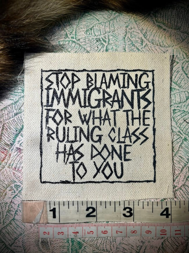 Stop blaming Immigrants sew on patch