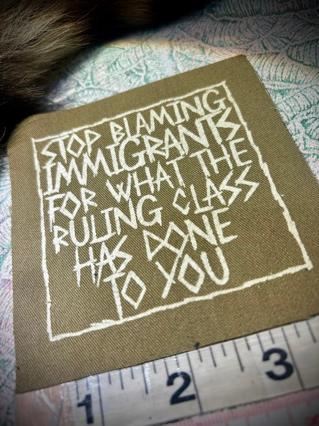 Stop blaming Immigrants sew on patch