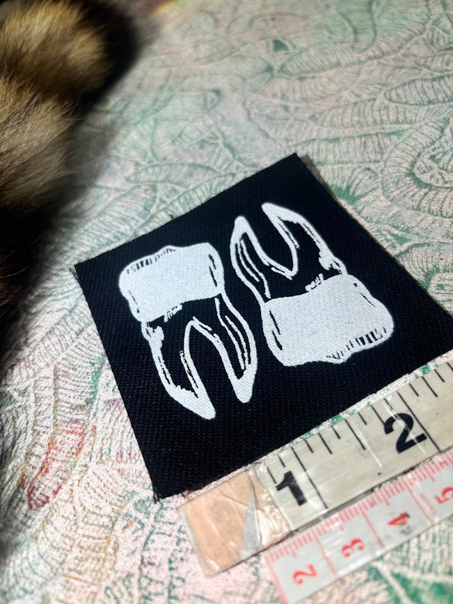 two teef tiny patch.