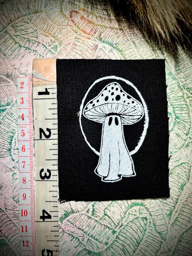 Tiny ghost mushroom patch