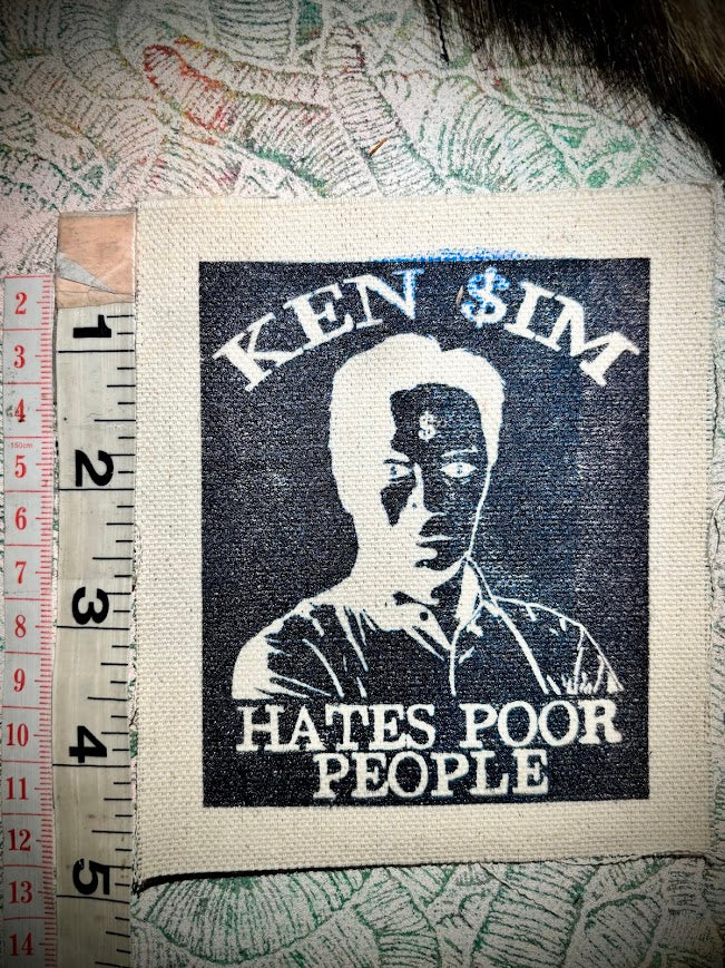 Ken Sim hates poor people sew on patch