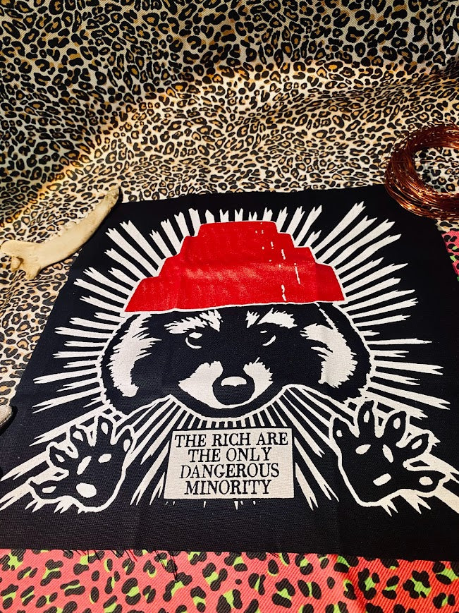 the rich are the only dangerous minority/raccoon devo back patch