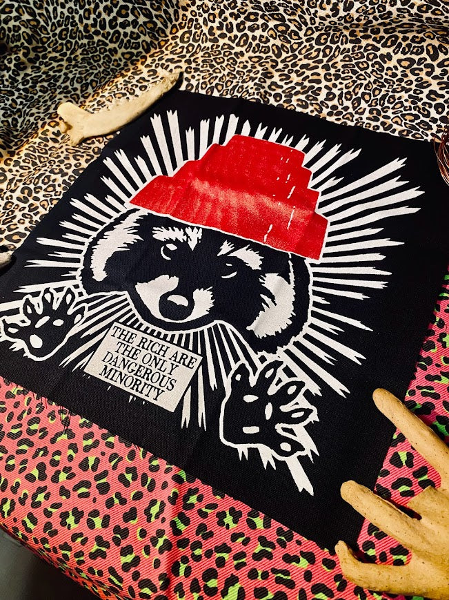 the rich are the only dangerous minority/raccoon devo back patch